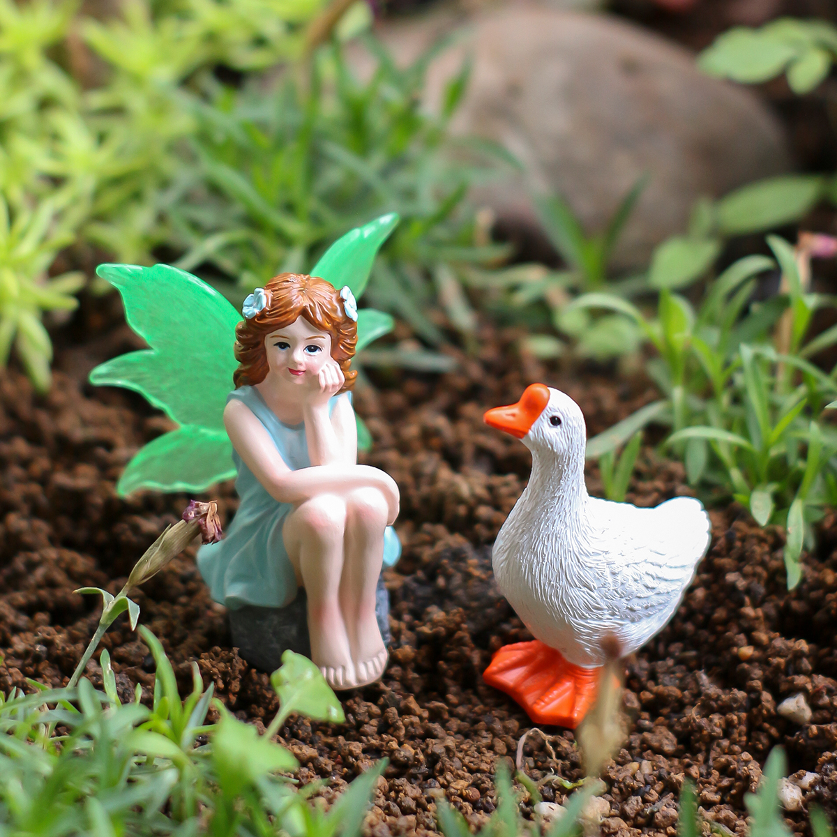 2 seated fairies and geese, cr - Bonsai Garden World avaliação e preço